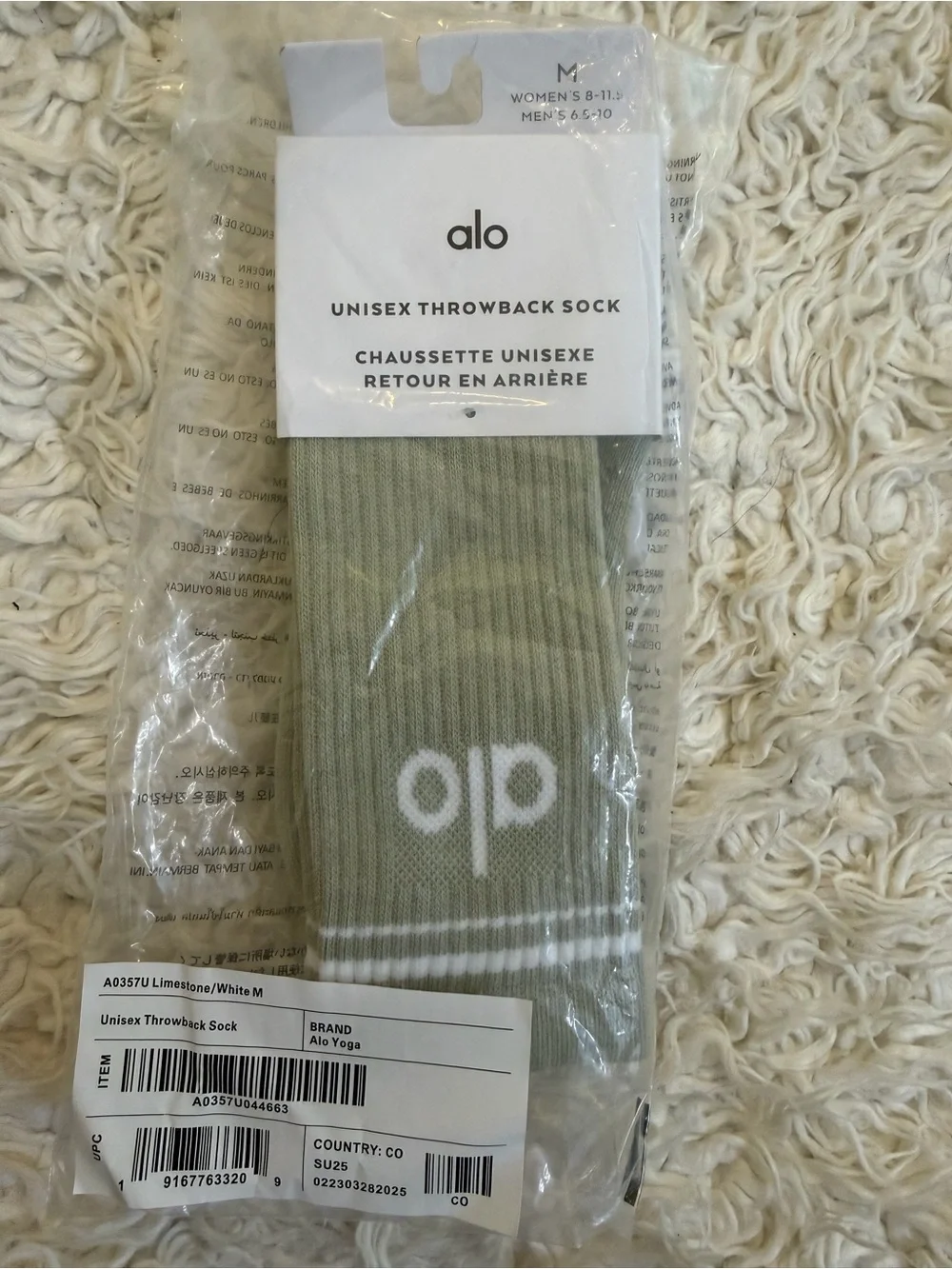 ALO Yoga Crew Socks in Sage Green with White Stripe